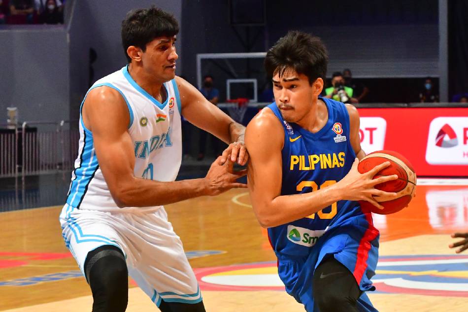 GIlas Pilipinas player Karl Kevin Quiambao (28) dribbles past Indian players during the FIBA World Cup Asian Qualifiers in Pasay City on July 3, 2022. Mark Demayo, ABS-CBN News