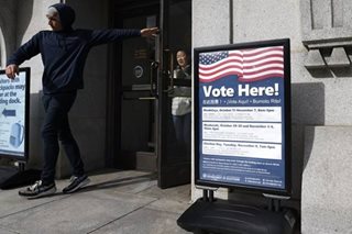 Officials scramble after balloting problems in US poll