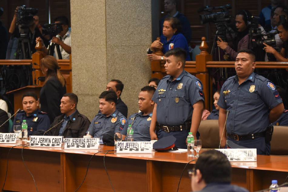 Caloocan police PO1 Jeffrey Perez and PO1 Ricky Arquilita, who were involved in the death of Carl Angelo Arnaiz attend a Senate hearing, Sept. 5, 2017. George Calvelo. ABS-CBN News/File 