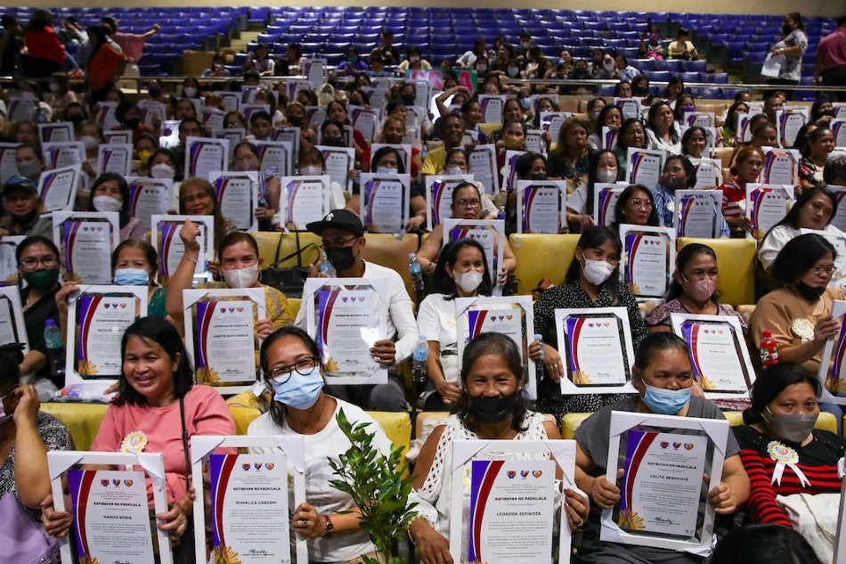 Recipients of Pantawid Pamilyang Pilipino Program (4Ps) from various cities in the National Capital Region receive their certificates from the Department of Social Welfare and Development (DSWD) during their ceremonial graduation at the Cuneta Astrodome in Pasay City on November 28, 2022. Jonathan Cellona, ABS-CBN News