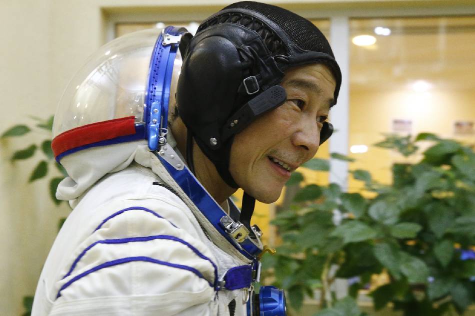 Space flight participant Yusaku Maezawa attends a training session ahead of the expedition to the International Space Station, in Star City, Russia Oct. 14, 2021. Shamil Zhumatov, Pool/EPA-EFE/File 