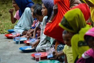 Feeding Rohingya refugees who fled by boat