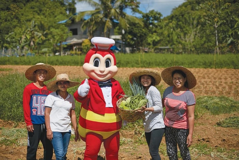 Since 2008, Jollibee Group Foundation has worked with partners through the Farmer Entrepreneurship Program to help equip farmers with business and leadership skills to help them sell to institutional markets and increase their income. Photo source: Jollibee Group Foundation