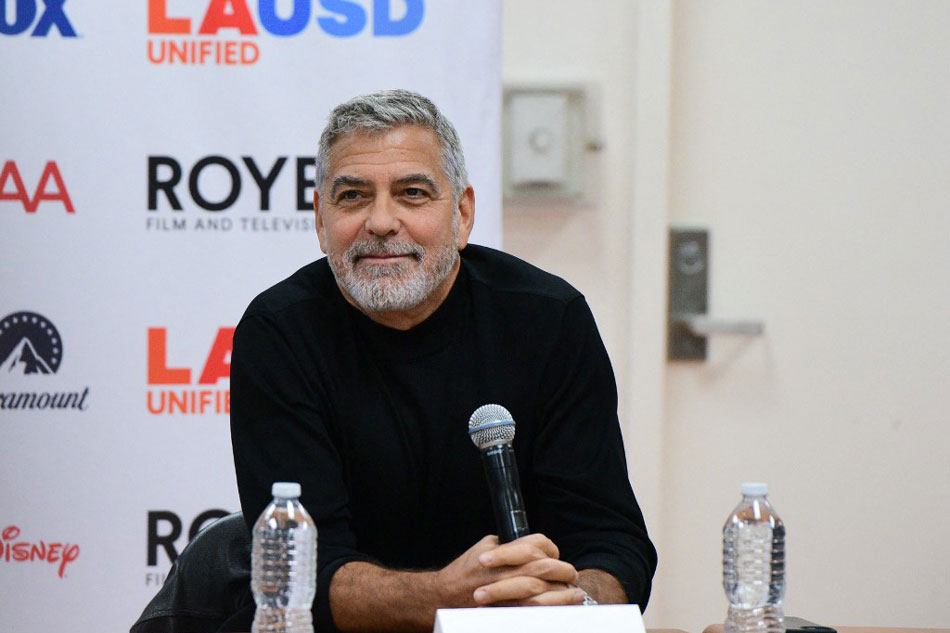 George Clooney speaks at the Edward Roybal Learning Center in Los Angeles, California in this January 9, 2023 file photo. Vivien Killilea, Getty Images for Roybal Film and Television Production Magnet School/AFP