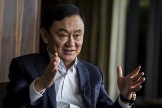 Ex-PM Thaksin vows to return to Thailand post-election