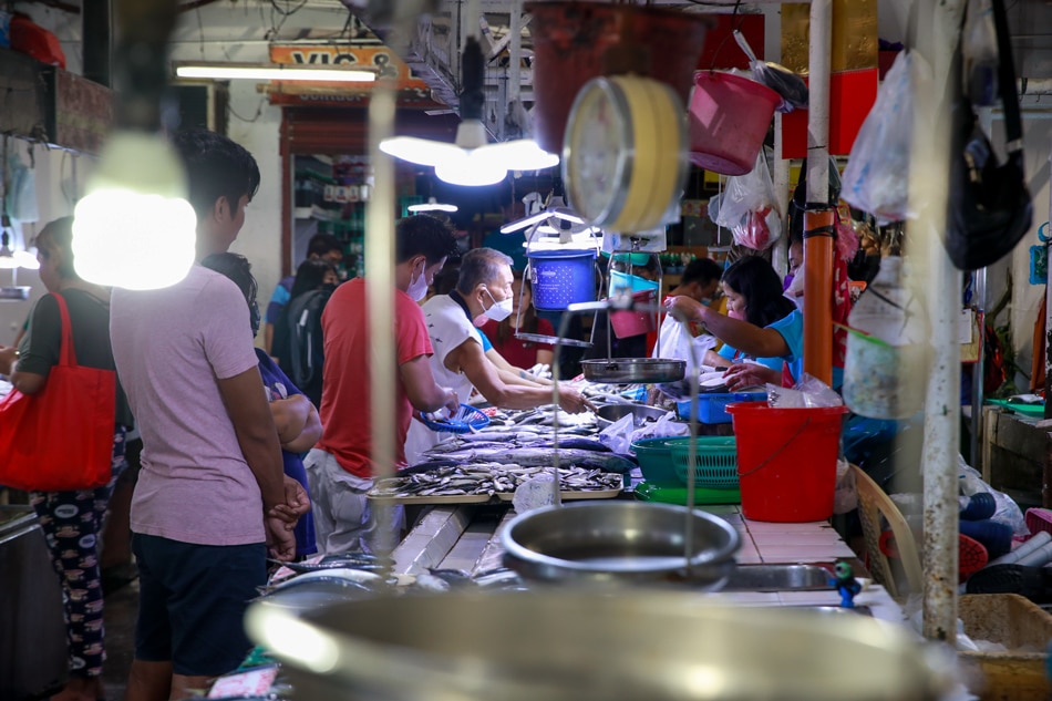 Vendors tend to their produce at the vegetable stalls in Guadalupe Public Market in Makati City on January 13, 2023. Jonathan Cellona, ABS-CBN News