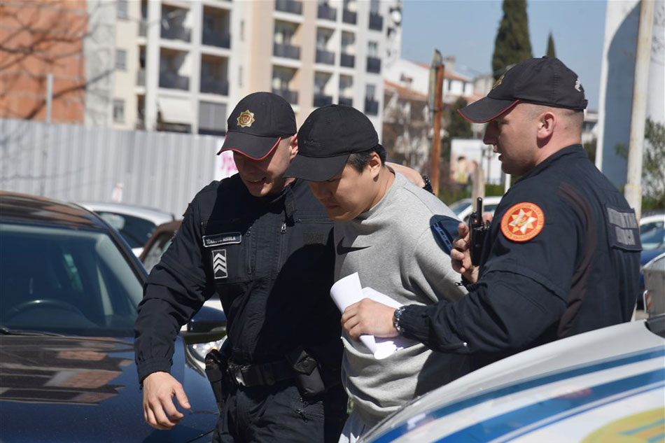 Police officers escort South Korean crypto mogul Do Kwon (C) in Podgorica, Montenegro on March 24, 2023. Do Kwon is wanted in South Korea, Singapore and the USA for the involvement in the collapse of his company Terraform, which is estimated to have cost investors more than 40 billion US dollars. Boris Pejovic, EPA-EFE