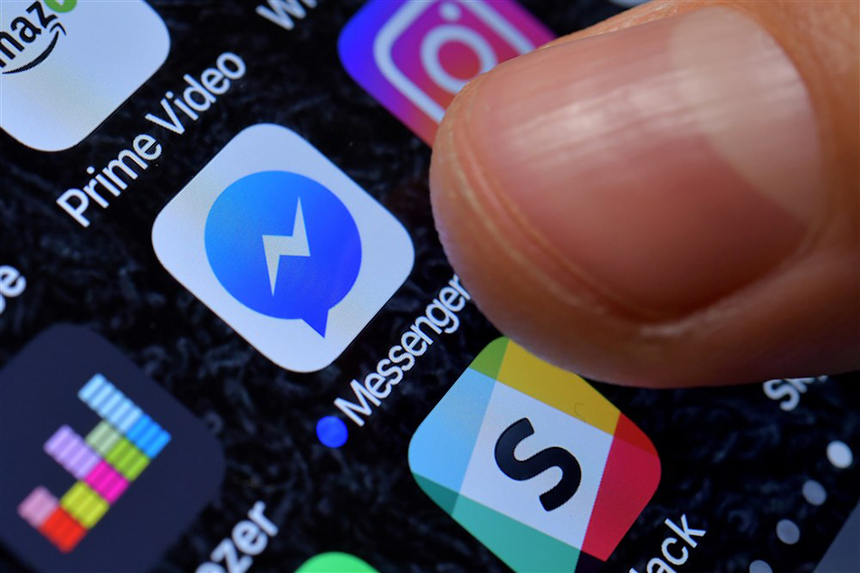 A close-up image showing the Facebook Messenger app on an iPhone in Kaarst, Germany on Nov. 8, 2017. Sascha Steinbach Illustration, EPA-EFE/File