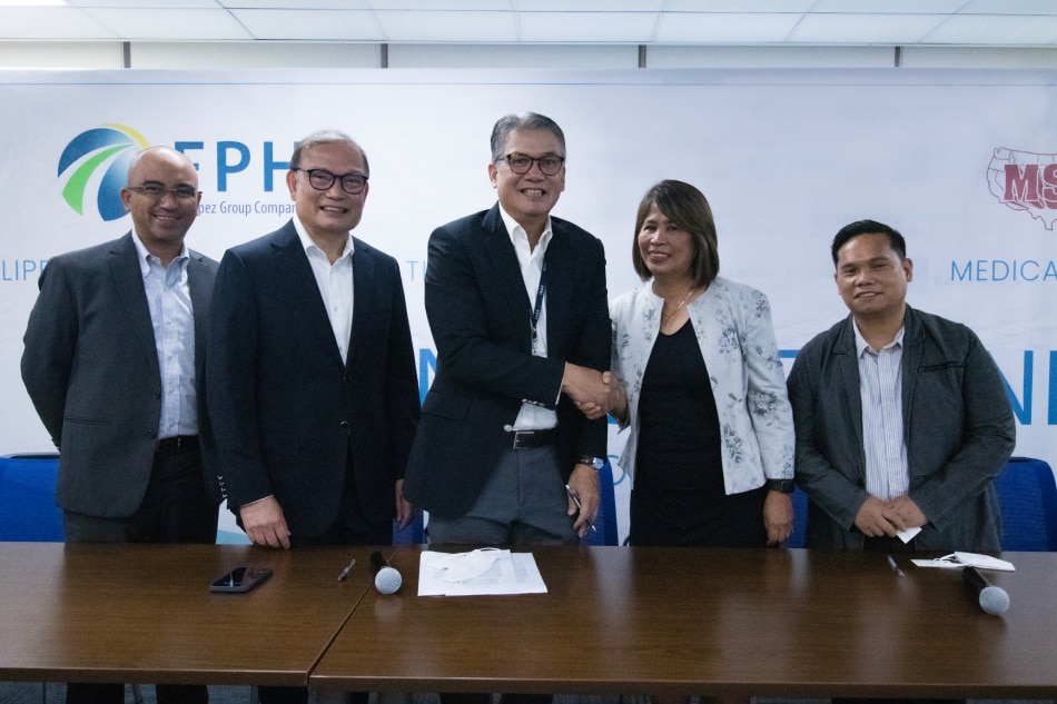 FPH President and COO Francis Giles B. Puno (center) and MSA-Philippines General Manager Aurora J. Dereja (second from right) signed the DOAA pursuant to the terms of the Share Sale and Purchase Agreement both companies forged in December 2022. Also in photo are (from left) Jose Valentin A. Pantangco Jr., FPH vice president and head, corporate planning; Joaquin E. Quintos IV, FPH senior vice president; and Hilario V. Manongtong, MSA-Philippines chief accountant. Handout