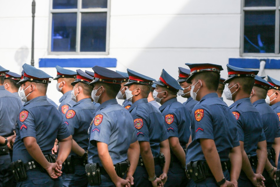  Police officers attend the Simultaneous Oath-Taking and Donning of Ranks of 2nd Level Uniformed Personnel (PCpl-PMAJ) under the CY 2022 Regular Promotion program at the Manila Police District headquarters in Manila on January 10, 2023. Jonathan Cellona, ABS-CBN News