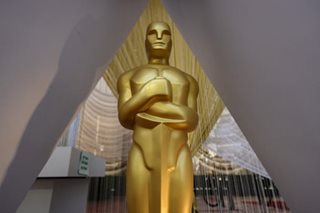 Oscars return - with slap jokes and hot dog fingers on menu