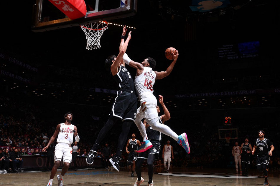  Donovan Mitchell (45) of the Cleveland Cavaliers drives to the basket during the game against the Brooklyn Nets at Barclays Center in Brooklyn, New York. Nathaniel S. Butler, NBAE via Getty Images/AFP