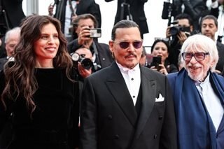 Johnny Depp receives warm welcome as comeback film opens Cannes