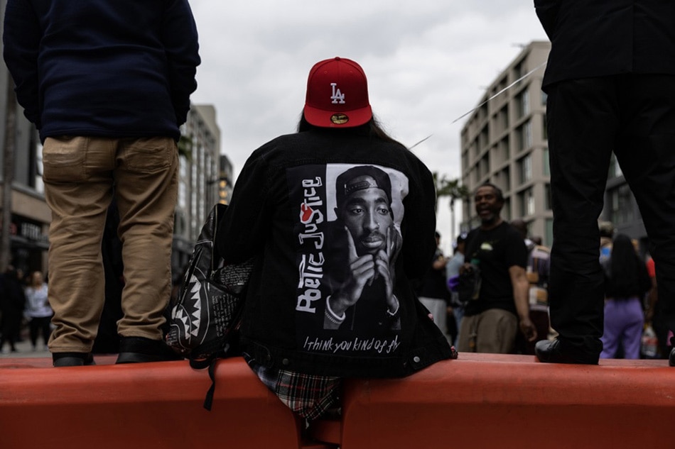 Hundreds of fans attend a ceremony honoring late US rapper Tupac Shakur with a star on the Walk of Fame in Hollywood, California, USA, 07 June 2023. Tupac Shakur posthumously received the 2,758th star on the Walk of Fame, in the category of Recording. EPA-EFE/ETIENNE LAURENT