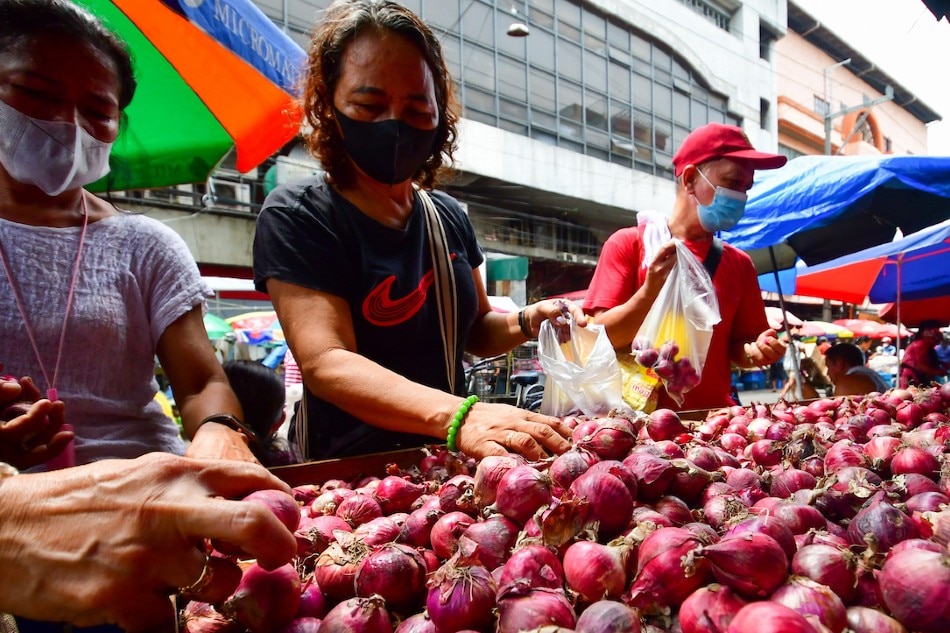 Red onions are being sold at a market in Manila on Oct. 12, 2022. Mark Demayo, ABS-CBN News/File