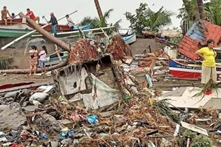 Marcos visits flood-hit Misamis, vows resettlement