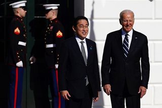 Biden, Kishida tout more muscular Japanese military role