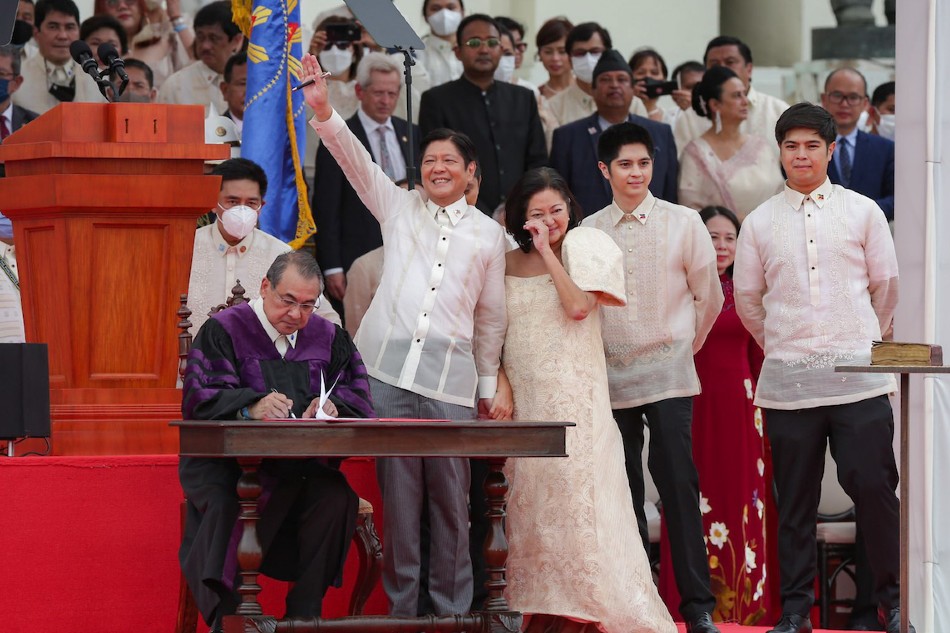 Ferdinand Marcos, Jr. greets supporters after taking his oath as the 17th President of the Philippines at the National Museum in Manila on June 30, 2022. George Calvelo, ABS-CBN News