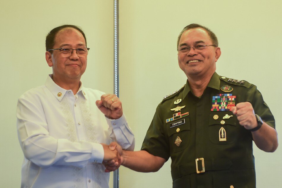 Department of National Defence Secretary Carlito Galvez JR (L) and Armed Forces of the Philippines General Andres Centino (R) during a press conference at officers' country hall in Camp Aguinaldo, Quezon City on Jan. 12, 2023. ABS-CBN News 