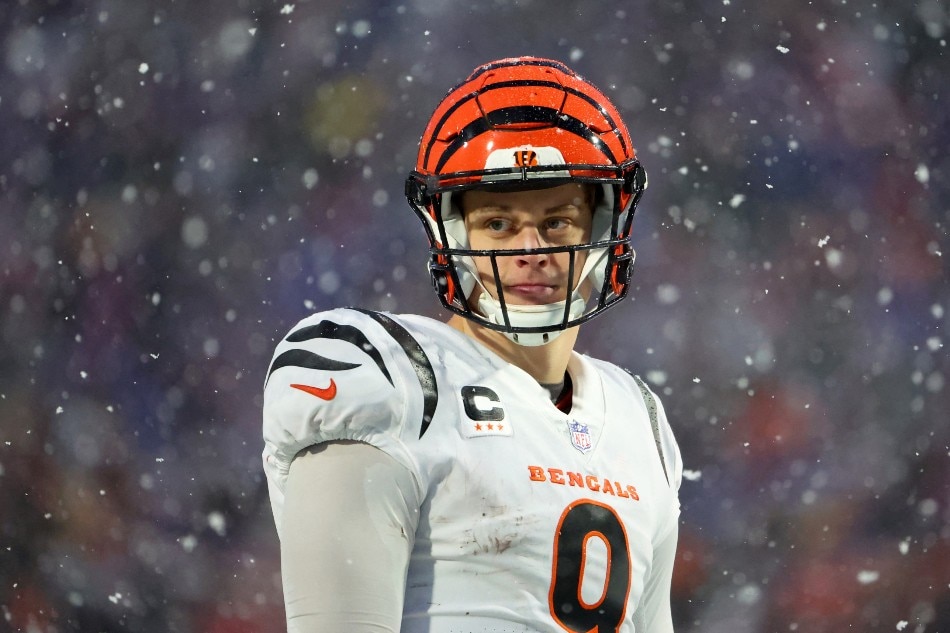 Joe Burrow #9 of the Cincinnati Bengals looks on against the Buffalo Bills during the third quarter in the AFC Divisional Playoff game at Highmark Stadium on January 22, 2023 in Orchard Park, New York. Timothy T Ludwig, Getty Images/AFP