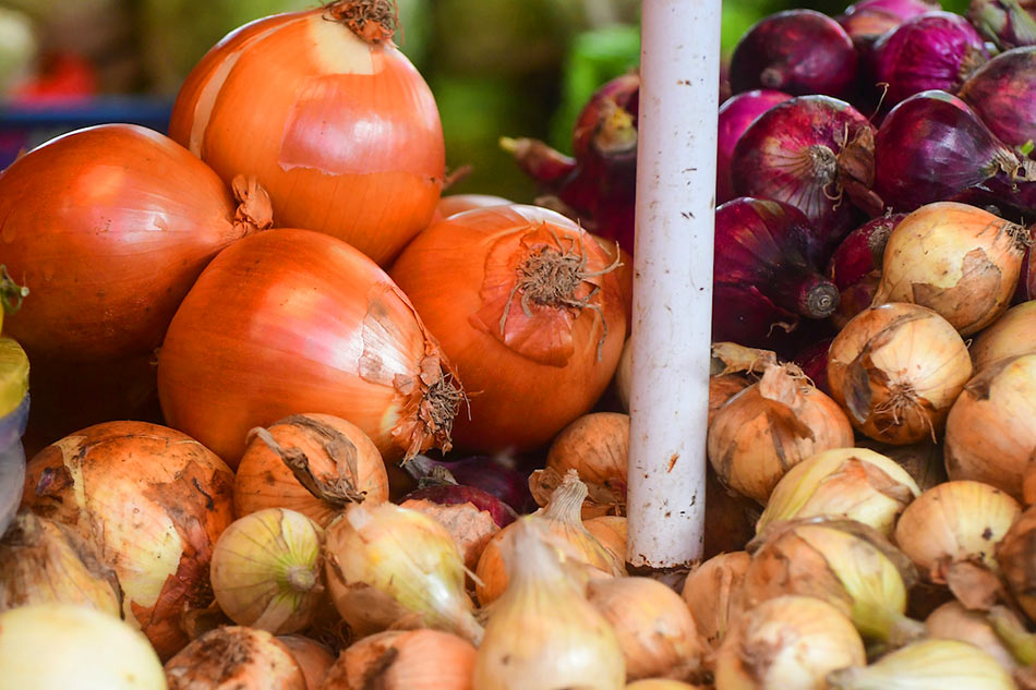 Onions go for sale in a market in Manila on January 17, 2023. Mark Demayo, ABS-CBN News