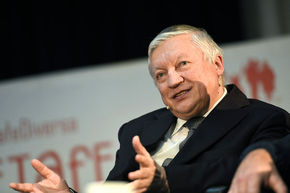 World chess champion Anatoly Karpov having a simultaneous display