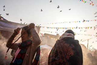 Nepalese Buddhists pray for world peace