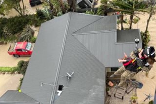 Survivors plucked from rooftops as New Zealand cyclone kills three