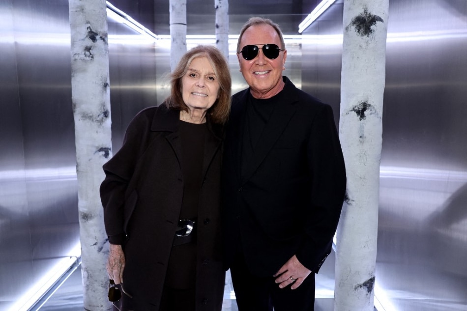 Gloria Steinem and Michael Kors attend the Michael Kors Collection Fall/Winter 2023 Runway Show in New York City. Jamie McCarthy, Getty Images for Michael Kors/AFP