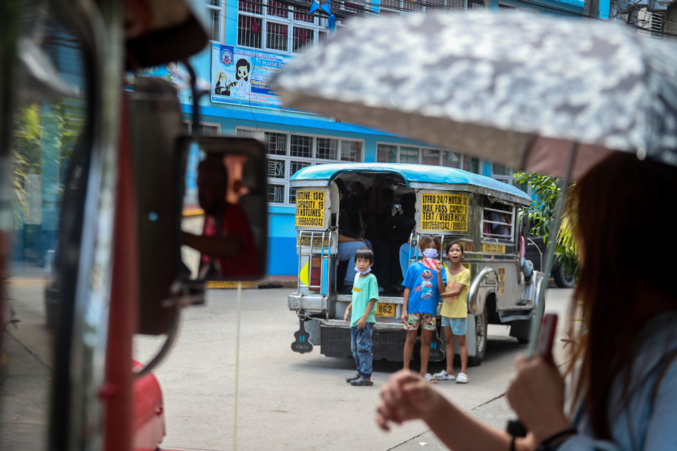  Children help drivers at a jeepney terminal in Quiapo, Manila call on passengers to ride on July 14, 2022. Jonathan Cellona, ABS-CBN News/file 