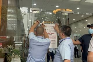 Makati shuts Smart headquarters due to alleged permit, tax violations