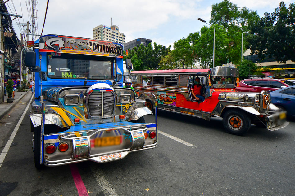 A modern jeepney traverses along Buendia Avenue in Makati City on March 1, 2023. The Land Transportation Franchising and Regulatory Board gave June 30 as a deadline for traditional jeepney drivers and operators to comply with industry consolidation and upgrading to modern jeepneys under the Public Utility Vehicle modernization program. Mark Demayo, ABS-CBN News.