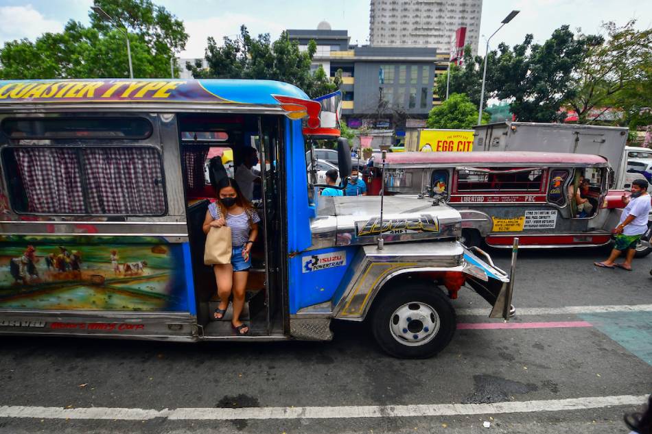A modern jeepney traverses along Buendia Avenue in Makati City on March 1, 2023. Mark Demayo, ABS-CBN News