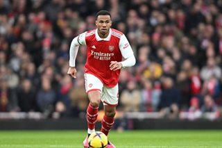 Arsenal regain five-point lead with Fulham stroll