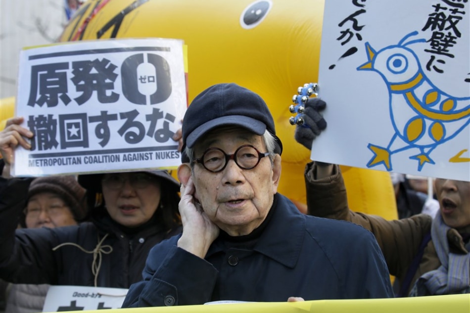 A file picture dated March 15, 2014 shows Kenzaburo Oe, 1994 Nobel laureate in Literature, demonstrating with anti-nuclear power plant protesters in central Tokyo, Japan. Kimimasa Mayama, EPA/File