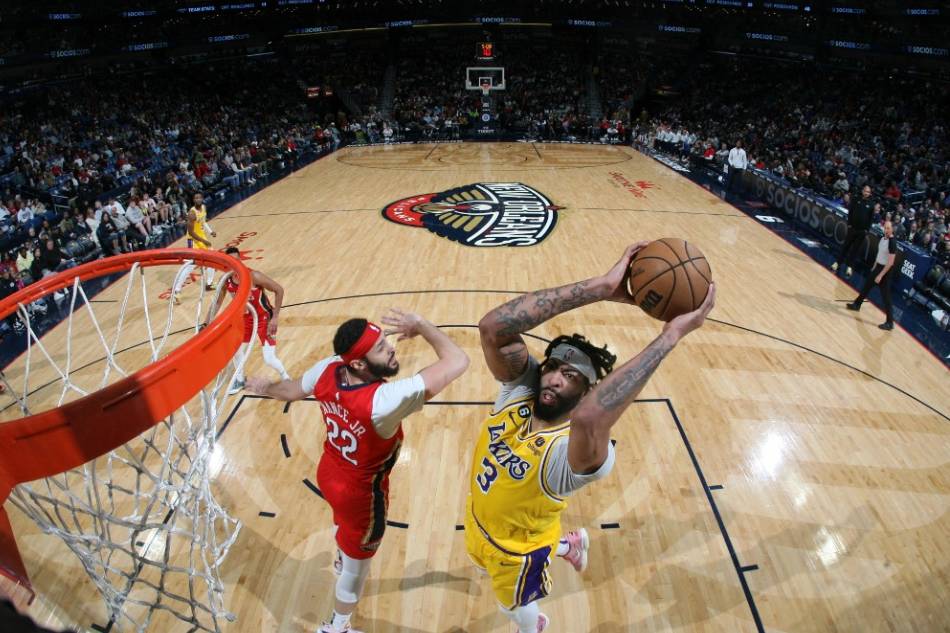 Anthony Davis (3) of the Los Angeles Lakers drives to the basket during the game against the New Orleans Pelicans at the Smoothie King Center in New Orleans, Louisiana. Jonathan Bachman, NBAE via Getty Images/AFP