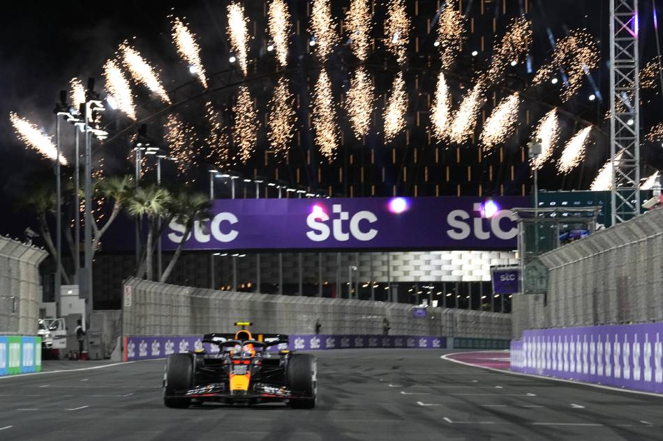 Mexican driver Sergio Perez of Red Bull Racing wins the Formula One Grand Prix of Saudi Arabia at the Jeddah Corniche Circuit, Saudi Arabia, March 19, 2023. Luca Bruno, EPA-EFE.