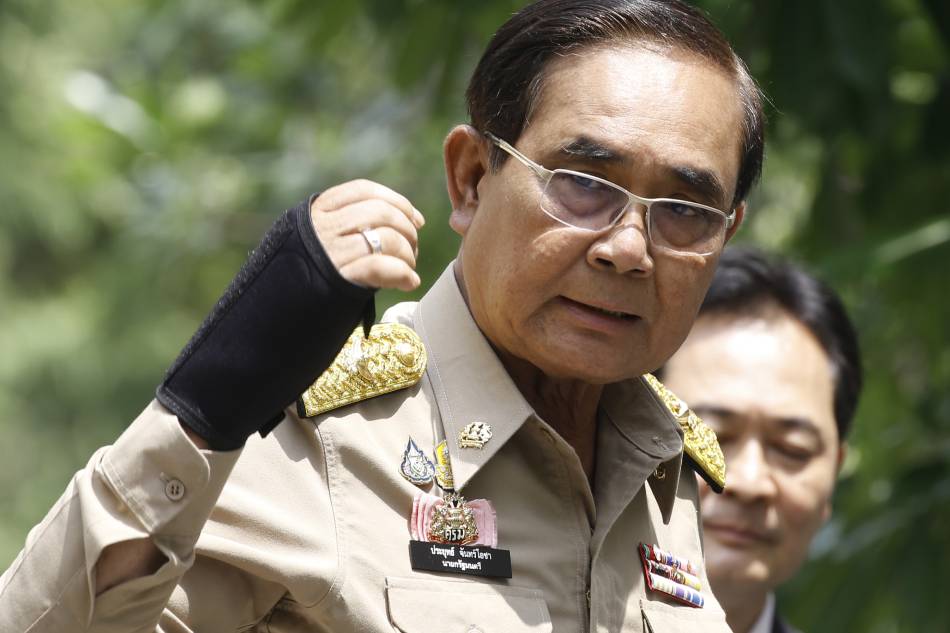 Thai Prime Minister Prayut Chan-o-cha gestures as he addresses the media at the Government House in Bangkok, Thailand, March 20, 2023. Prayut announced on Feb. 21 his plan to dissolve the House of Representatives before his government's four-year term ends on March 23, 2023, paving the way for a general election expected to take place in May, when the former junta leader plans to run for premiership. EPA-EFE/NARONG SANGNAK