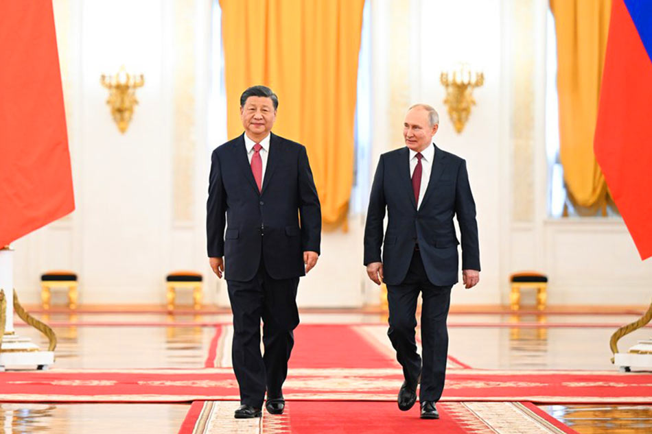 Russian President Vladimir Putin holds a solemn welcome ceremony for Chinese President Xi Jinping at the St. George's Hall at the Kremlin in Moscow, Russia, 21 March 2023 (issued 22 March 2023). Xi held talks with Putin in Moscow. EPA-EFE/Xie Huanchi, Xinhua