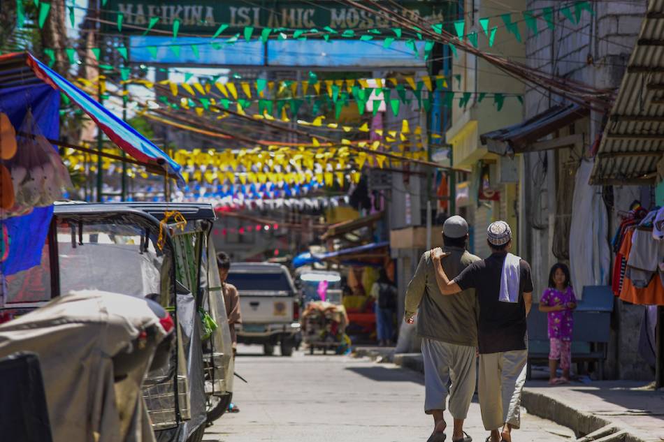 Filipino Muslims walk from the Marikina Islamic Grand Mosque on March 23, 2023 after praying at the start holy month of Ramadan. Maria Tan, ABS-CBN News