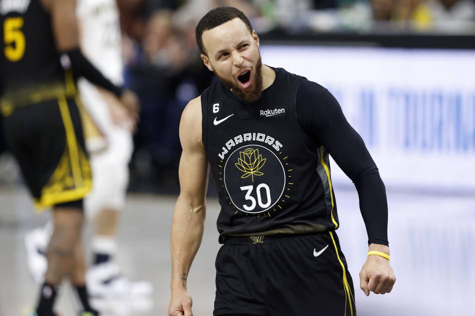 Golden State Warriors guard Stephen Curry reacts after shooting a three point basket against the New Orleans Pelicans during the fourth quarter of the NBA game at Chase Center in San Francisco, California, USA, March 28, 2023. John G. Mabanglo, EPA-EFE.