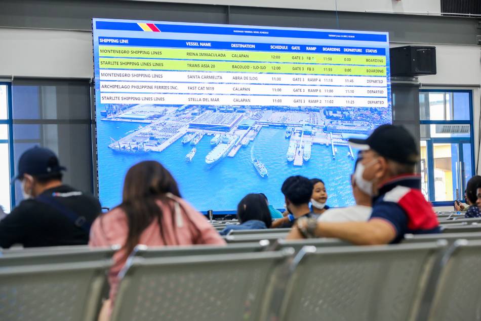 Travelers enter the upgraded Integrated Passenger Terminal Building of the Port of Batangas in Batangas City, on June 14, 2022. Jonathan Cellona, ABS-CBN News/File.