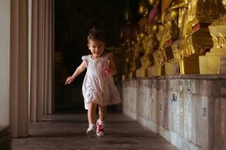 'Cutest little tourist' Dahlia explores Thailand with parents Anne, Erwan