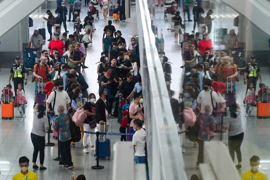 Passengers arrive at the Ninoy Aquino International Terminal 3 in Pasay City on April 5, 2023. Mark Demayo, ABS-CBN News