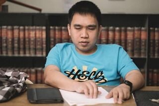 Visually-impaired student passes bar exams