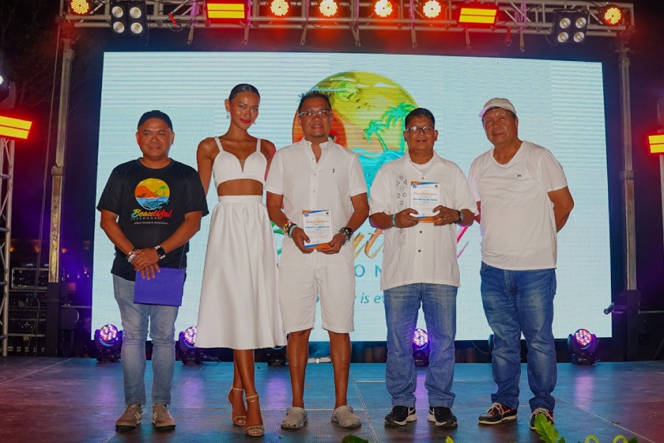 (Left to right) Present at the launch of Sorsogon's new tourism campaign are provincial tourism officer Bobby Gigantone, Sorsoganon model Maria Isabela Galeria, DOT Bicol regional director Herbie Aguas, TPB domestic promotions department division chief Cesar Villanueva, and governor Edwin Hamor. Handout