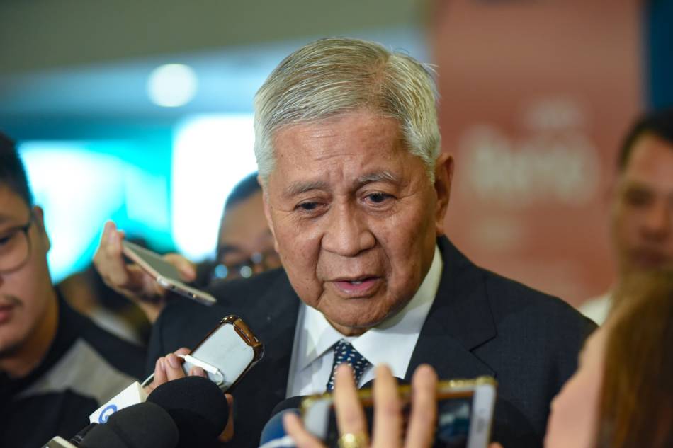 Former DFA Secretary Albert del Rosario answers questions from the media as he arrived at the NAIA Terminal 3 on June 21, 2019. George Calvelo, ABS-CBN News/File.