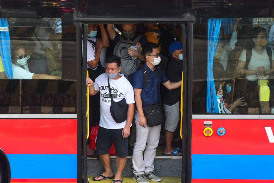 Passengers ride the EDSA Bus Carousel from the Roosevelt station in Quezon City on April 25, 2023. The Department of Transportation reminds commuters to follow the mandatory mask wearing in trains and buses amid rising cases of COVID-19. Mark Demayo, ABS-CBN News