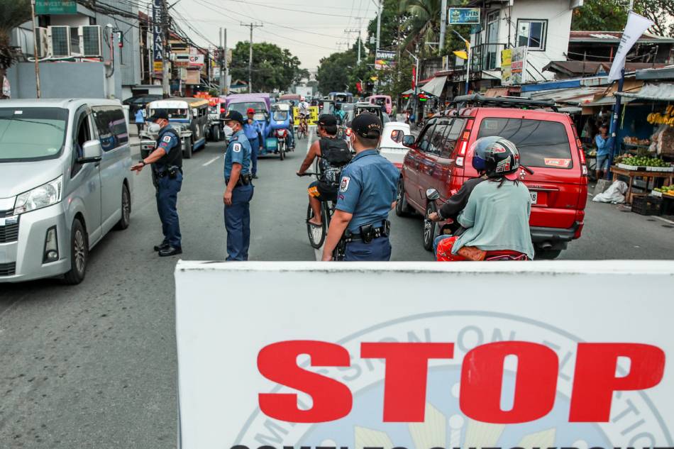 Members of the Philippine National Police (PNP) conduct a Commission on Elections (Comelec) checkpoint near the border of Tanza and Trece Martires in Cavite on February 20, 2023, ahead of the February 25 special elections. Jonathan Cellona, ABS-CBN News/File.