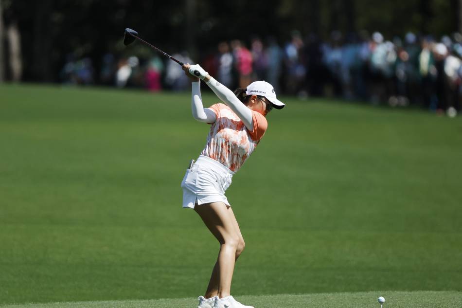 Rose Zhang of the US hits her tee shot on the fourteenth hole during the final round of the Augusta National Women's Amateur golf tournament at the Augusta National Golf Club in Augusta, Georgia, USA, April 1, 2023. John G. Mabanglo, EPA-EFE/File.